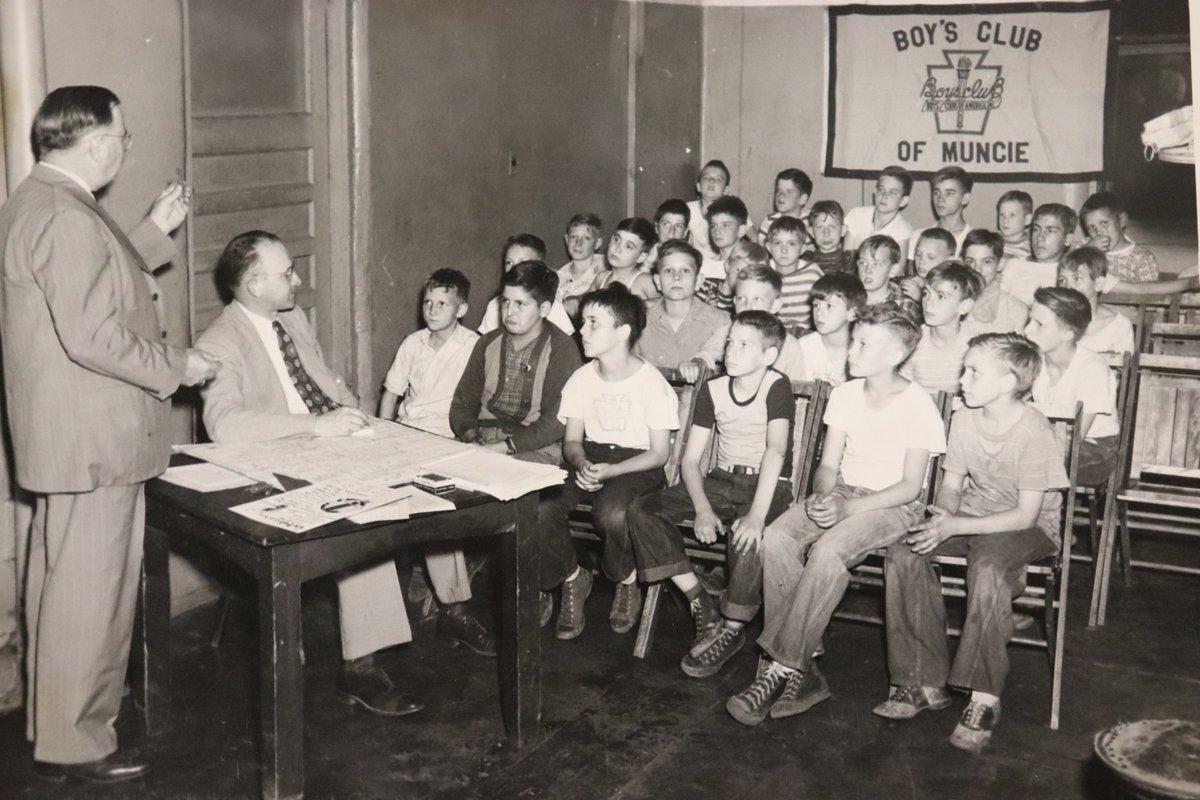This week we'll be taking a Look Back in History ahead of our 90th Anniversary next year! This photo shows a guest speaker talking to our Club members about 65 years ago, which is something we still do today. Stay tuned the rest of this week for more history from our Clubs!