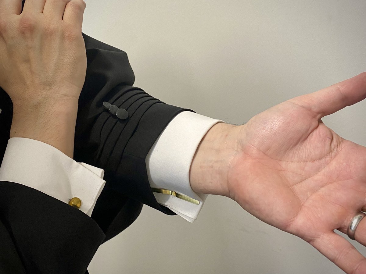 RobertMBen's tweet photo. The document brad fasteners will have to do when you forget your cufflinks on day 19 of your jury trial. https://t.co/W2kOprmzV4
