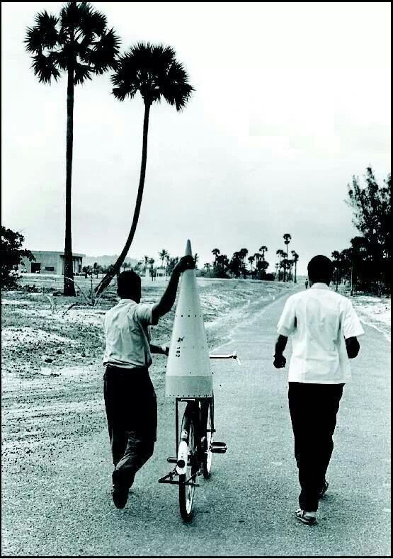 asIiceofhistory's tweet photo. India scientist transporting parts of their first space rocket 1963 https://t.co/2N16sEmEiq