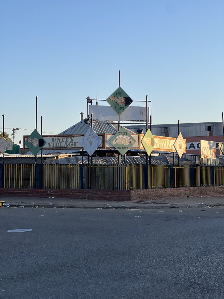 SimbaNembaware's tweet photo. Once upon a time when we needed a visa ukuya eMzansi this was the place to get "original" stuff #UnityVillage #Bulawayo https://t.co/XBHCl7X742