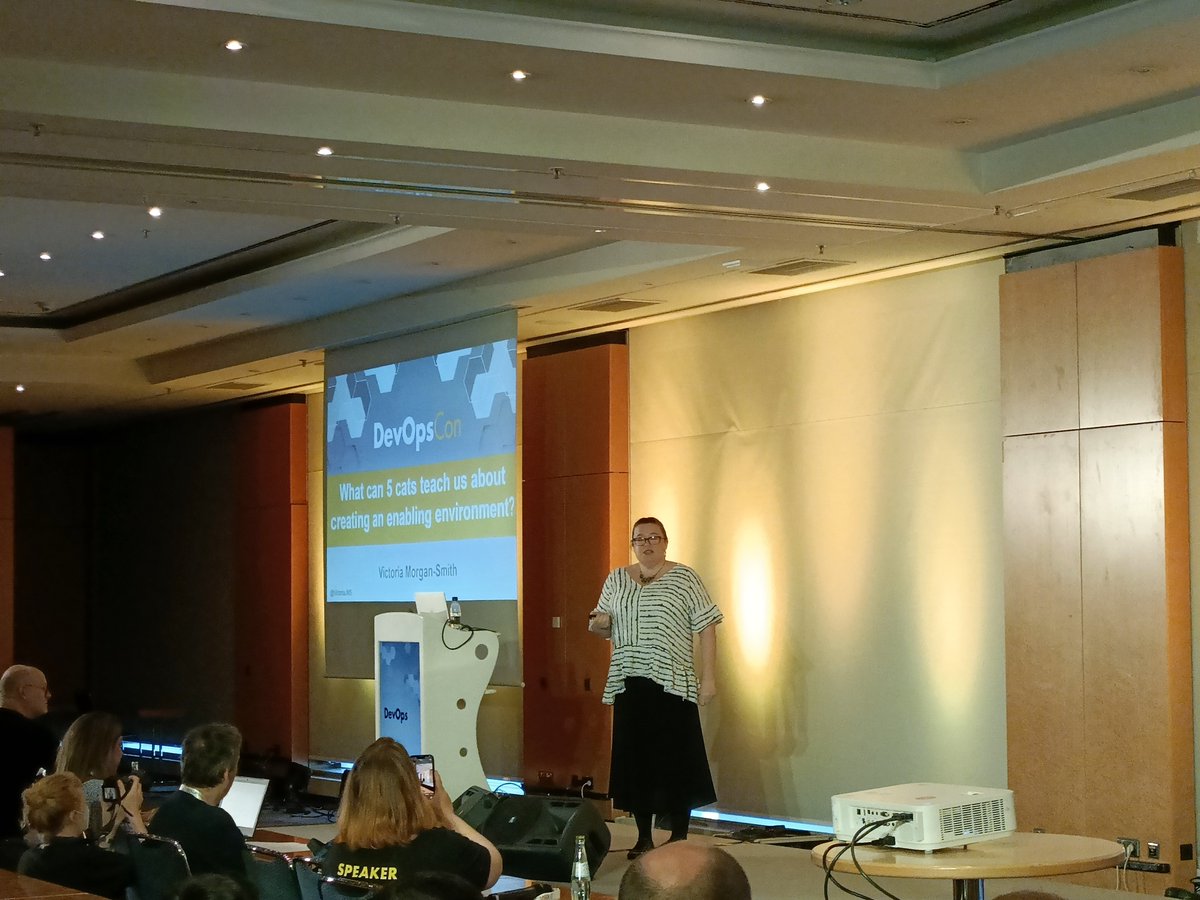 devops_con's tweet photo. We start with our first keynote which deals about what does it take to create a team environment that inspires ambition and creativity? How do we create a culture of generosity? If you want to learn, join the @devops_con and the keynote of Victoria Morgan-Smith https://t.co/9rvd7hTij7