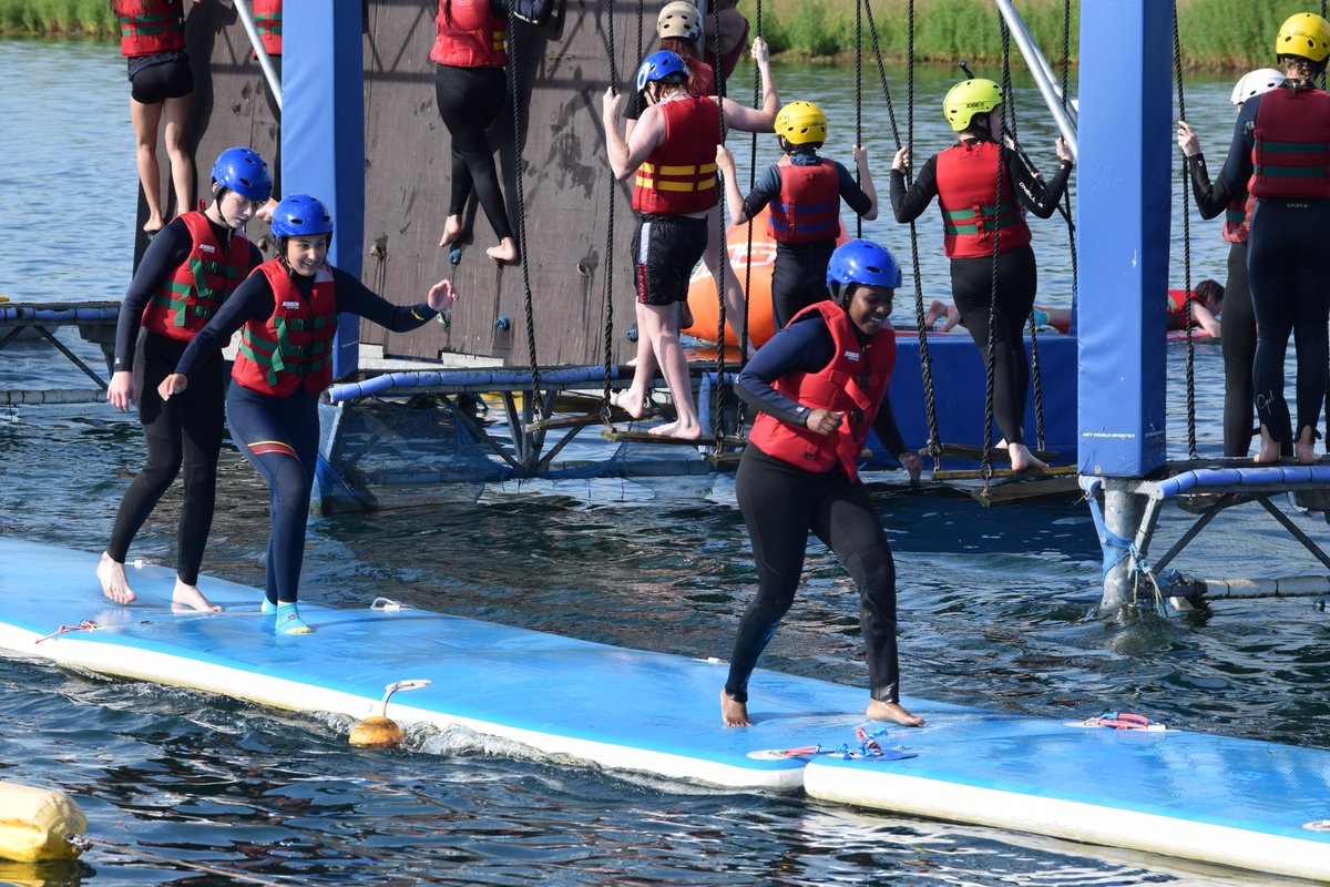 BedfordModern's tweet photo. The annual House Water Sports event at @BoxEndPark yesterday saw more than 200 students in Years 7 and above take to the water to conquer the Aqua Park, compete in the paddleboard relay or climb their way across the mighty ninja course! What a great way to spend a sunny evening. https://t.co/uyVjA6DrDl