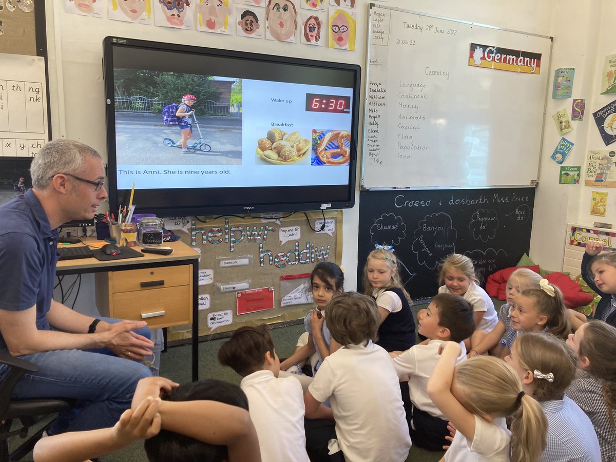 SullyPS's tweet photo. How is life different for children in Germany? #SPSyear2 want to know! Diolch to Mr Hansen-Magnusson for coming to tell us all about life in Germany so that we can write all about it. We were fascinated to hear how the school day was so different to here. #SPSLLC #SPSmfl https://t.co/xMeDN2Td9Q
