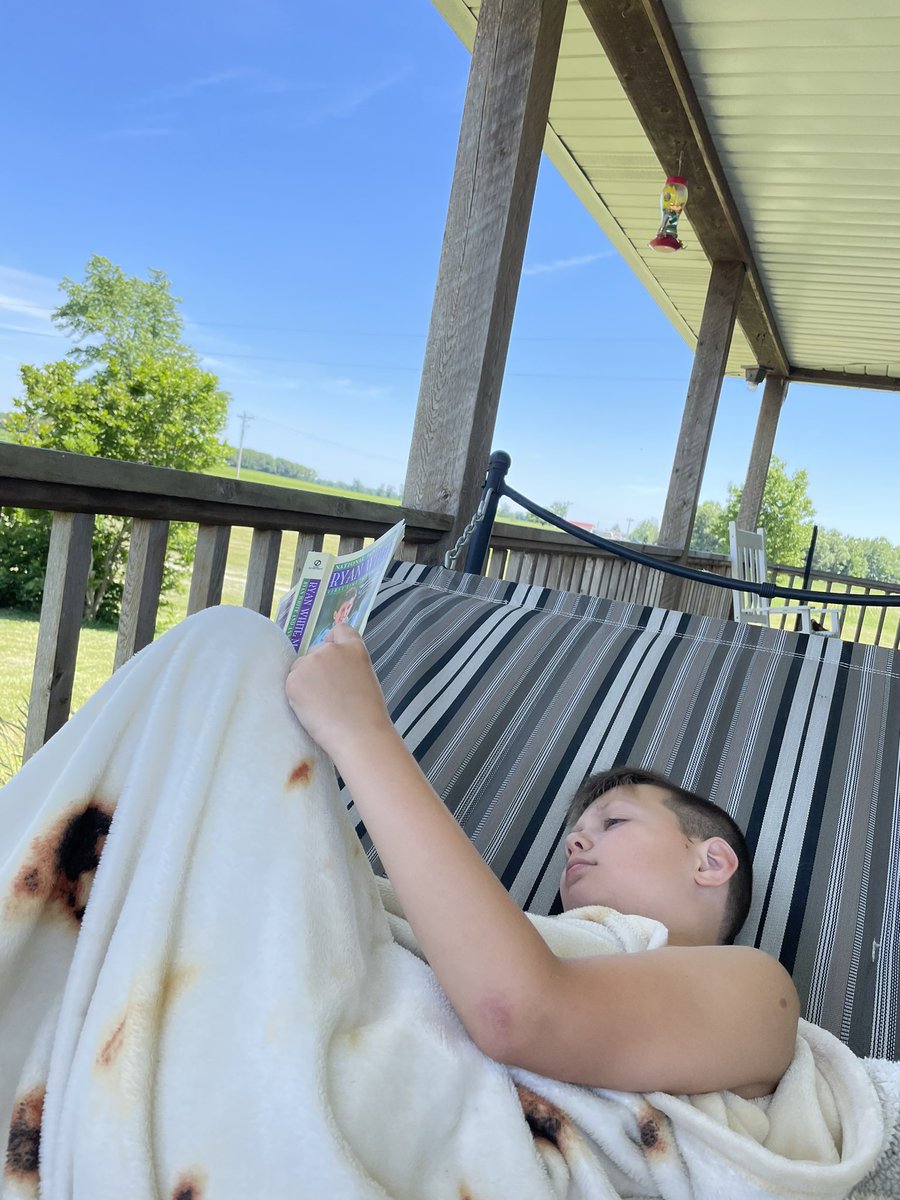 sarahLreed's tweet photo. It was a beautiful weekend and #GunnerFranklin started his Summer Enrichment Class through @hhmslmc by reading Ryan White’s “My Own Story” to me. #HuskiesRead Book 1 of 6 📚 https://t.co/TWviW3j5zF