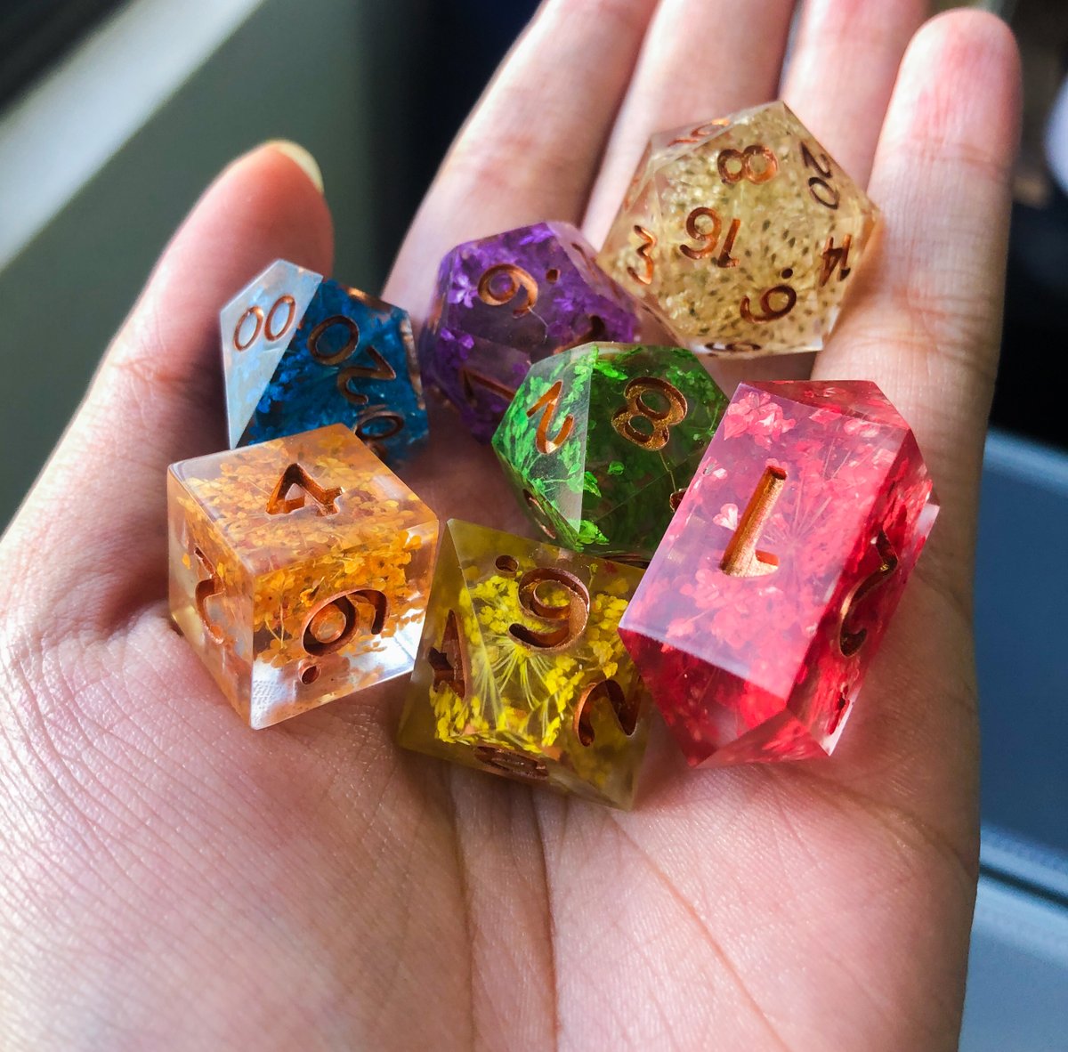 fateweaverdice's tweet photo. Hope we're not late to Pride Month! Here's a Rainbow Dice Set we made for @german_cheese that has a bunch of different-colored flowers inside!😍 Who are YOUR queer DND characters? 🤔 Tell me about them!👇
#dnd #dndph #dicemaker #dicemakerph #dice #diceph #pride #pride2022 https://t.co/nFKNOxvhZK