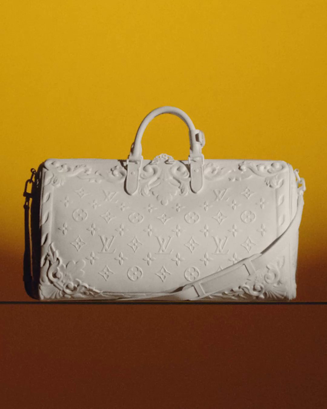 Louis Vuitton on X: #LVMenSS23 Architecturally informed. The new LV  Ornaments Keepall from the upcoming #LouisVuitton collection adds  molding-inspired detailing to the iconic bag. Watch the presentation live  on June 23rd at