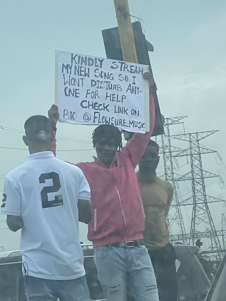 So i saw this guy holding this banner up at Jakande in Lekki in a bid to promote his music himself in the best way he can & thought to help him amplify it. I streamed it & it isn’t bad music. Irrespective, one stream doesn’t kill anyone.