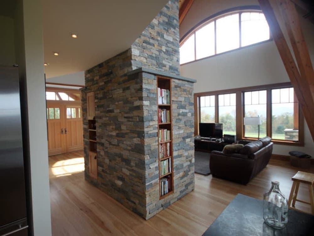 stoneyard's tweet photo. A soaring, converging ceiling with a twisted fireplace.  https://t.co/tg7eFdgPET https://t.co/n1YyVa0Fbs
