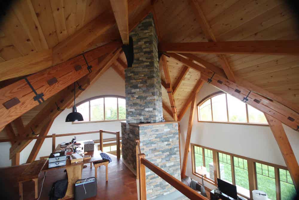 stoneyard's tweet photo. A soaring, converging ceiling with a twisted fireplace.  https://t.co/tg7eFdgPET https://t.co/n1YyVa0Fbs