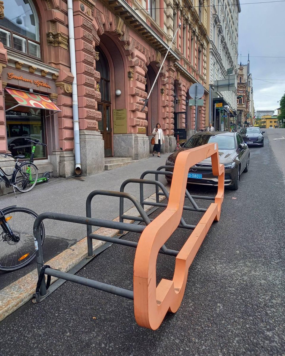 Visitors to the Netherlands Embassy in Helsinki will now be greeted with a big (orange) surprise!

They recently swapped one of their two on-street diplomatic car parking spaces for bicycle parking. It fits 12 bicycles rather than a single automobile.

Photo credit: <a href="/NLinFinland/">Netherlands Embassy in Finland</a>.
