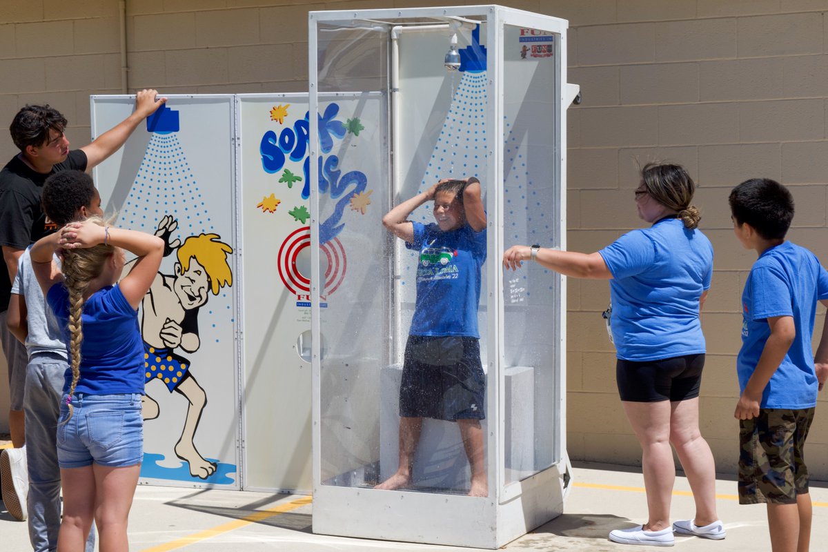 AVUSD's tweet photo. Yucca Loma's Summer Camp students spent Friday doing fun outside activities! There were games, mini golf, a dunk tank, and a water inflatable! https://t.co/NYJo82muAc