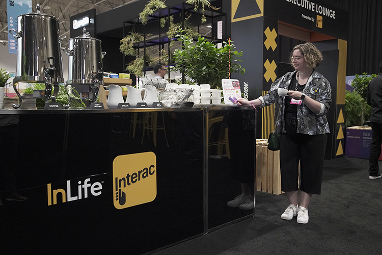 INTERAC's tweet photo. Come stop by our donation wall at @CollisionHQ  In partnership with @nanoleaf and @tiptappay, we are matching donations up to $25,000 in support of @redcrosscanada relief efforts for those impacted by the humanitarian crisis in Ukraine. https://t.co/FiXyA1K0U8