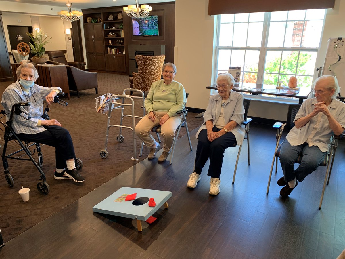 With the weather so hot outside, we brought the cornhole game inside !