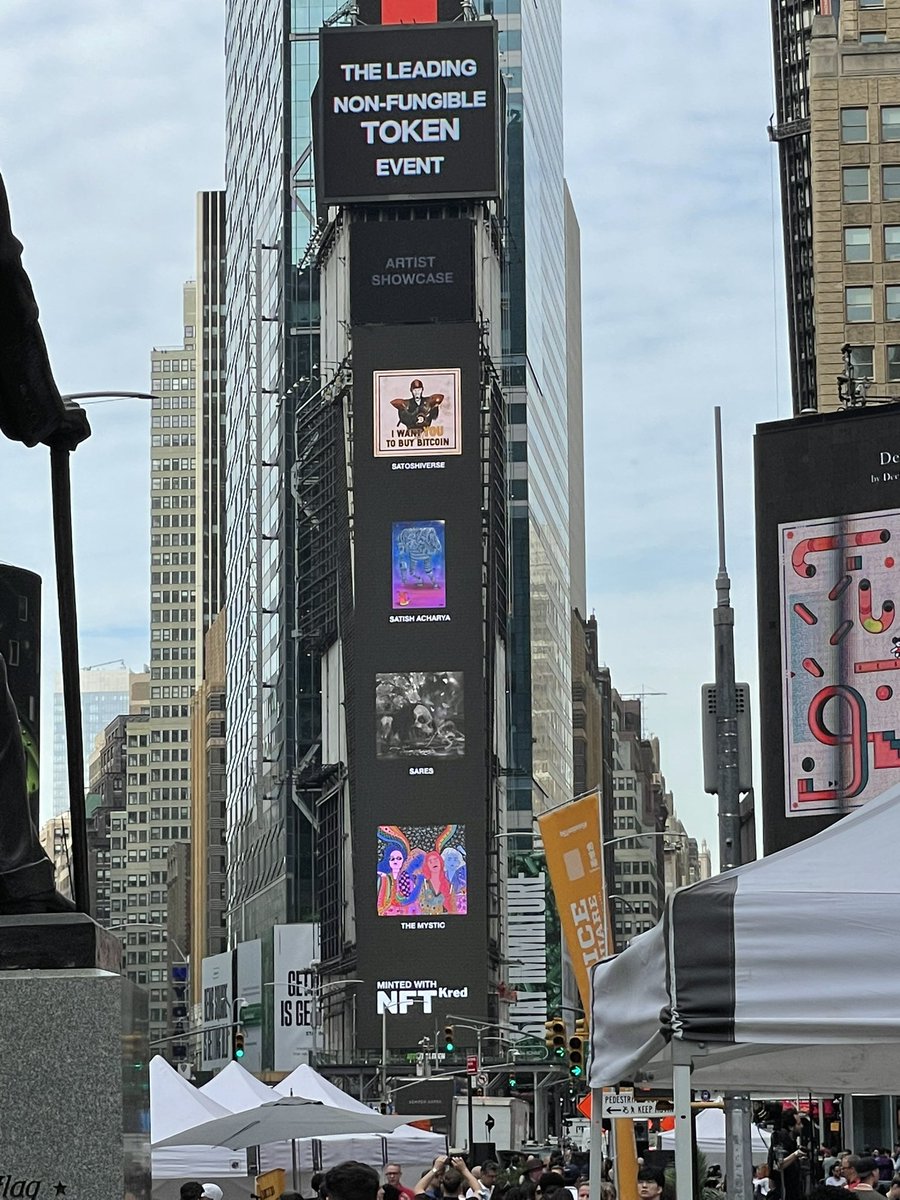 satishacharya's tweet photo. Absolutely thrilled to see my NFT artwork at Times Square as a part of @NFT_NYC #NFTNYC2022 Thanks @soulcurryart for sharing the photo. https://t.co/BsAoZntQDG