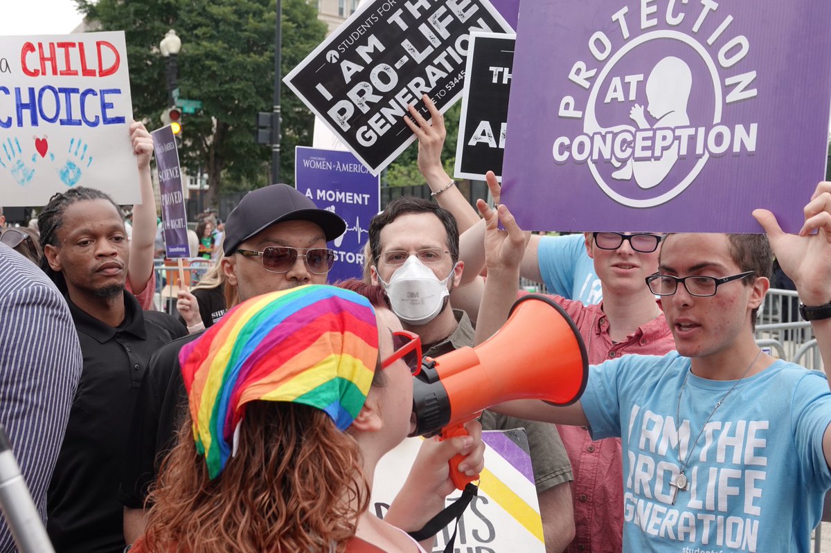 DustanHeistand's tweet photo. Abortion rights and anti-abortion demonstrators face off outside the U.S. Supreme Court on June 21, 2022, as a decision on Roe v. Wade looms. https://t.co/nnSPglONv8