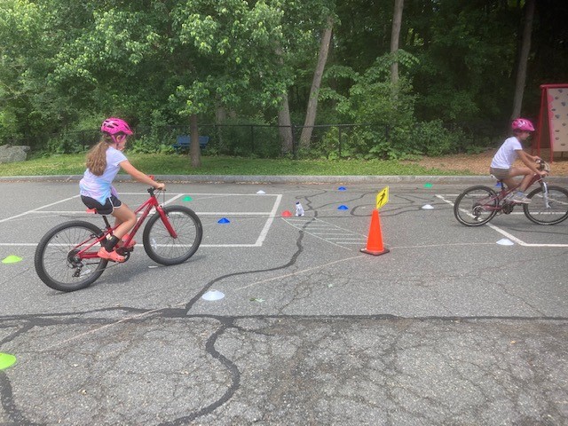 SafeRoutes_MA's tweet photo. Bates Elementary had 3 days of #srts #bikerodeos! Students had fun weaving through cones, yielding at crosswalks, & practicing riding as slowly as possible without losing balance. Thanks @bwglawboston for the helmets! #ProjectKidSafe @Batesprincipal @WellesleySupt @MassDOT https://t.co/fCfGON2gEX