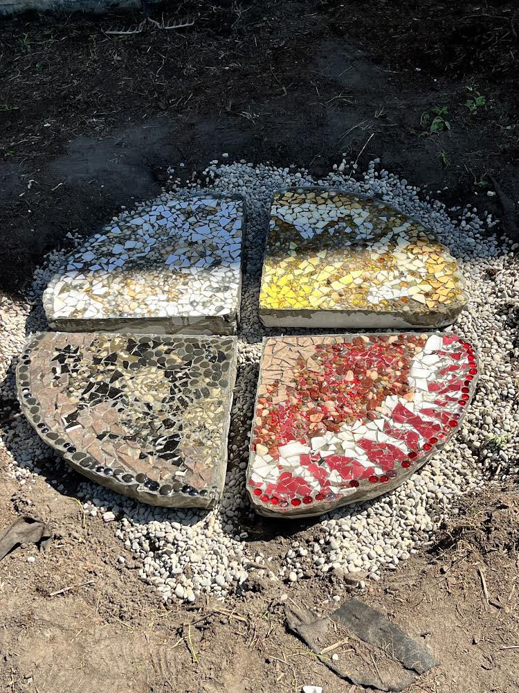 eci_IMPACT's tweet image. Been years in the making, but today we are thrilled to recognize National Indigenous Peoples day by getting the Medicine Wheel Mosaic into the ground by our butterfly garden. @ECI_Events @livinglifeontheroad @sheena_gruber @yoyobethell @wrdsb