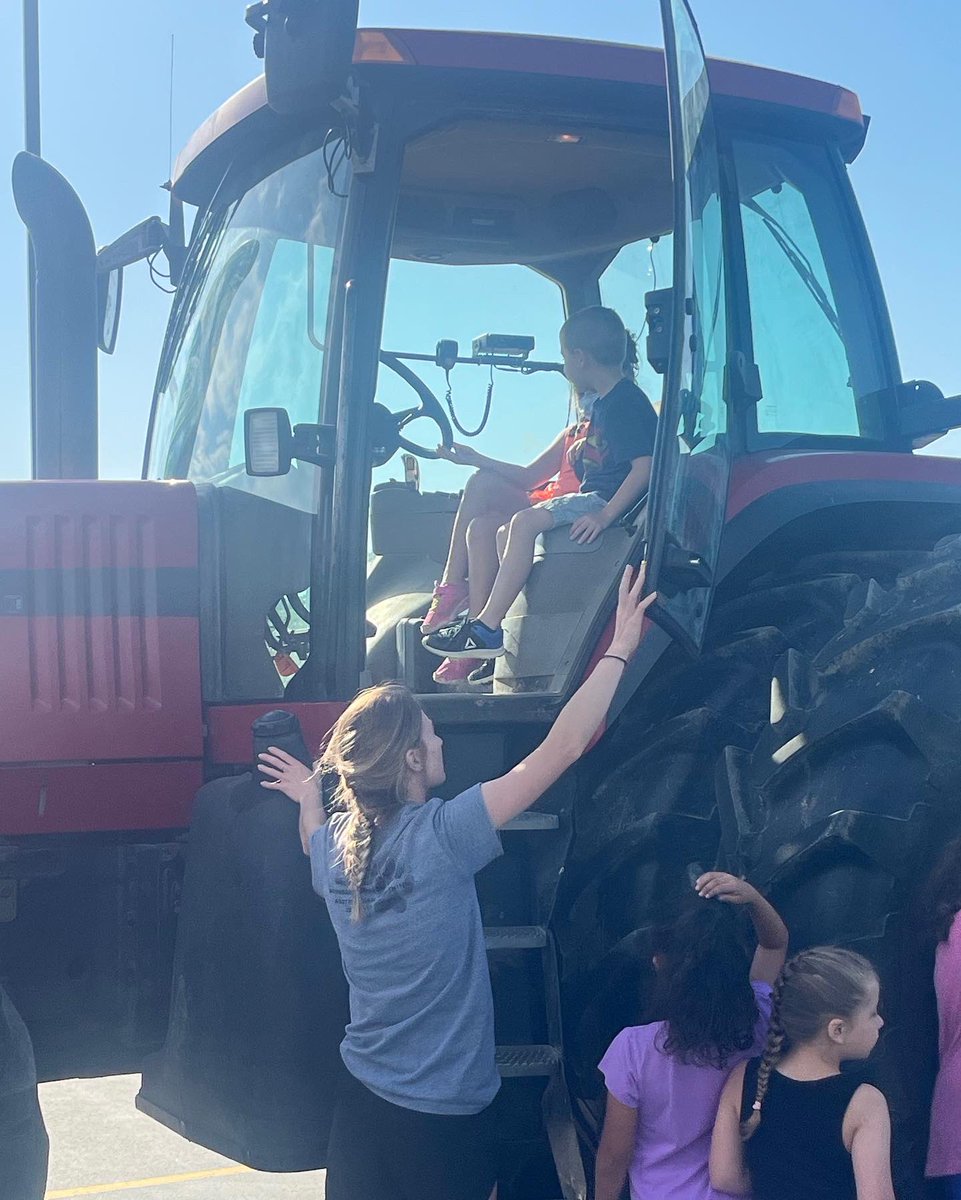 Summer school is getting interesting!!  Thanks Ms. Thiel for bringing in the tractor!