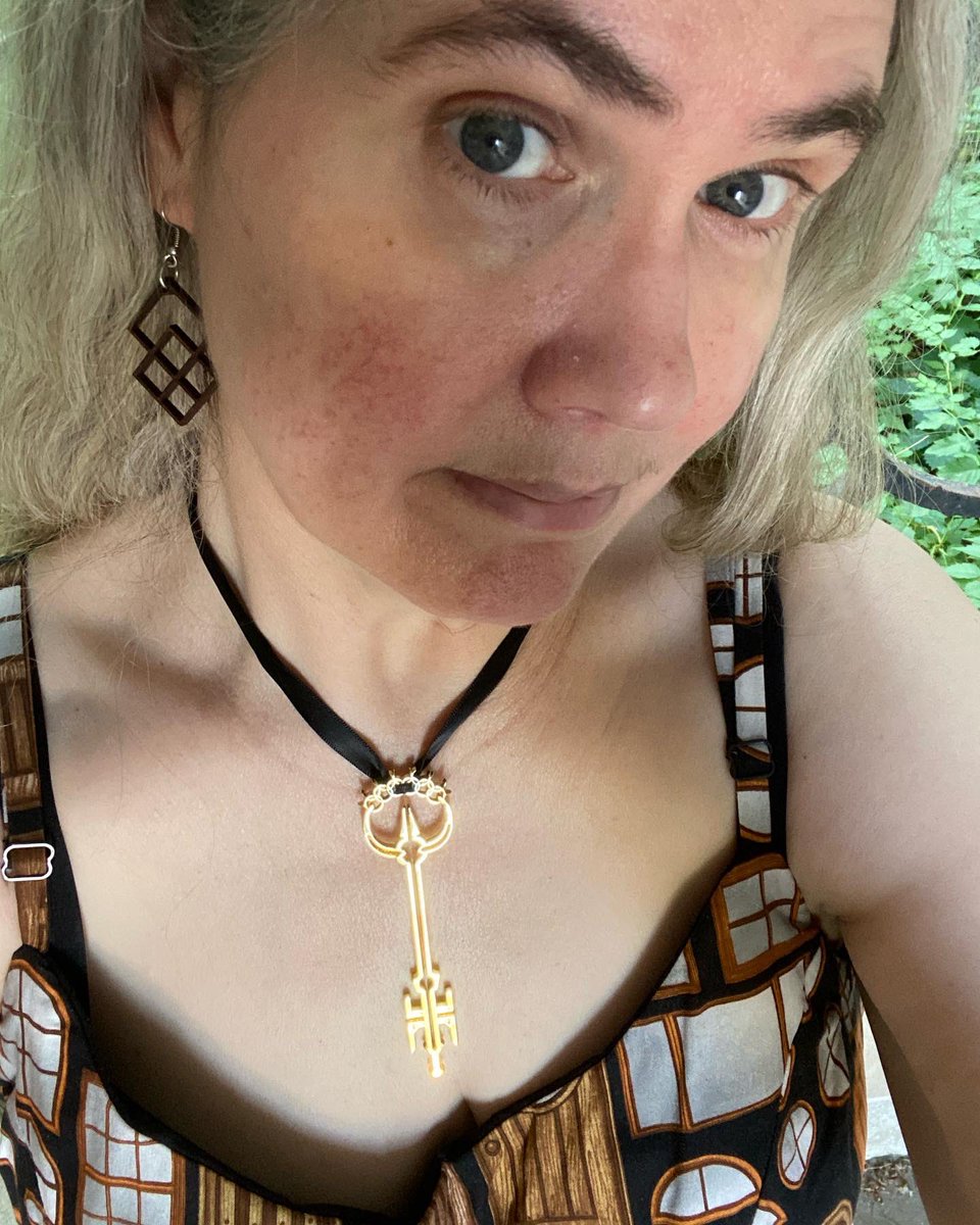 lhskarka's tweet photo. Today’s #jewelryaesthetic is keys. Also sort of doors & windows. My necklace is the Anywhere Key by @SkeltonCrew, just in case I need to make a quick get away. The earrings are carved wood from South Africa & remind me of window frames. #workingfromwork #lfk https://t.co/Y7G0yfOHZQ