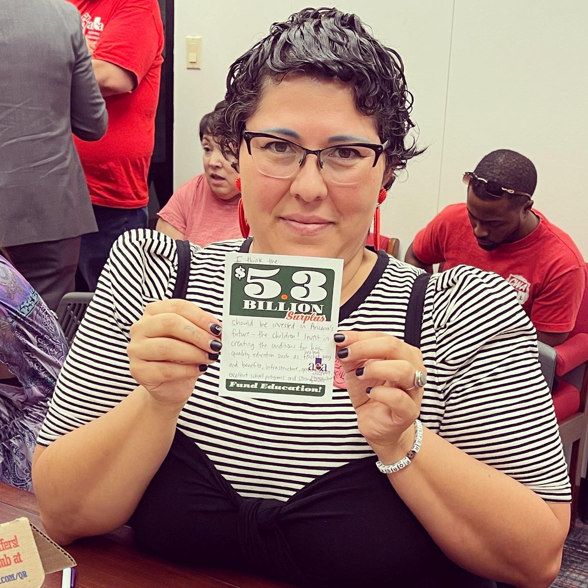 ArizonaEA's tweet photo. AEA members writing postcards to #azleg why they need to use $5.3 billion surplus to invest in public schools. #educatorsbudget https://t.co/kNGWVDoLTm