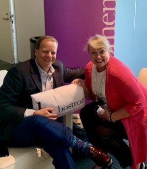 ssmithAMC's tweet photo. Fun to hang out with Jeanne Sheehy and her colleagues in the @bostromamc lounge at  #forumforward22! #brandedpillows #brandedsocks #colleagues @connect2amc https://t.co/CeJcBmuA6i