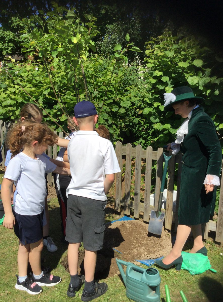 BuildwasAcademy's tweet photo. Two new trees donated by Buildwas Parish Council and planted today by the High Sheriff of Shropshire will form a gateway to our forest school. A memory for the children cherish as both they and the trees grow and flourish. #queensplatinumjubilee #queensgreencanopy #thankyou https://t.co/noYcjnLy3p