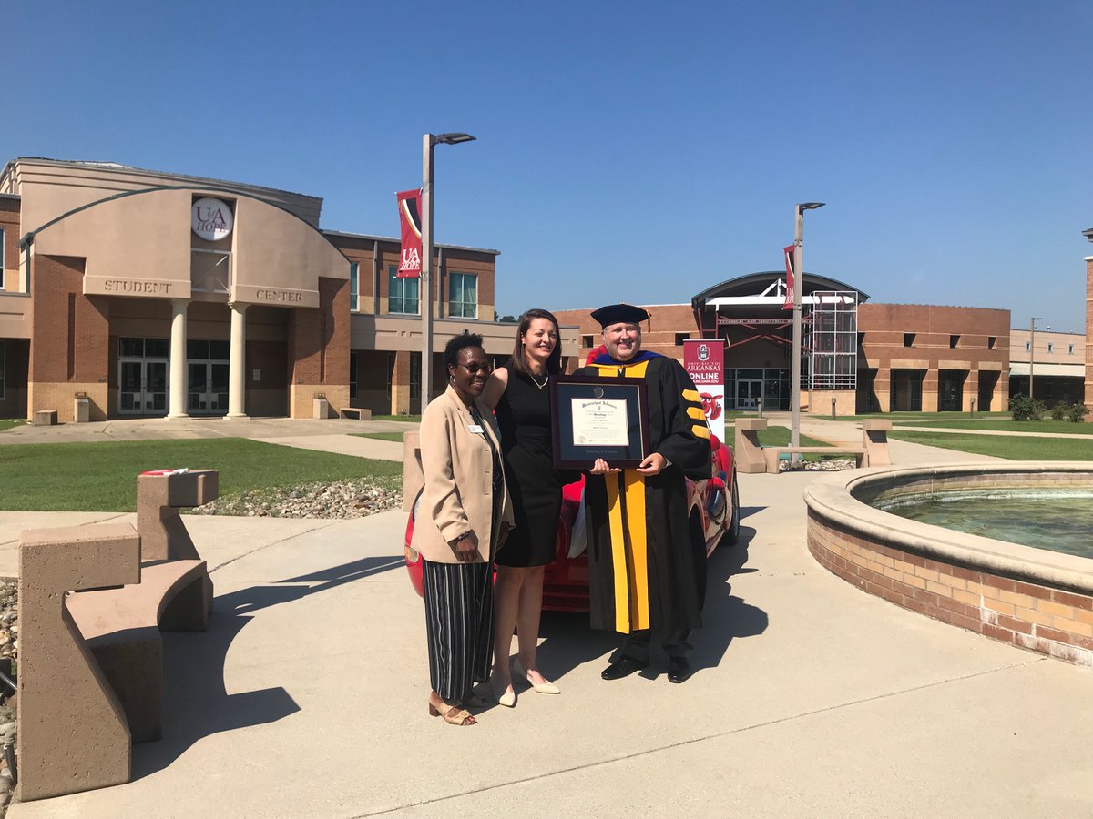 UARKOnline's tweet photo. Dr. Michael Hevel from @uacoehp presented framed diploma to Gabrielle Patterson, who teaches at UA Community College Hope-Texarkana. She earned her M.Ed. In Community College Leadership.

#razorbugtour #onlinelearning https://t.co/ZlHcS62ZCU
