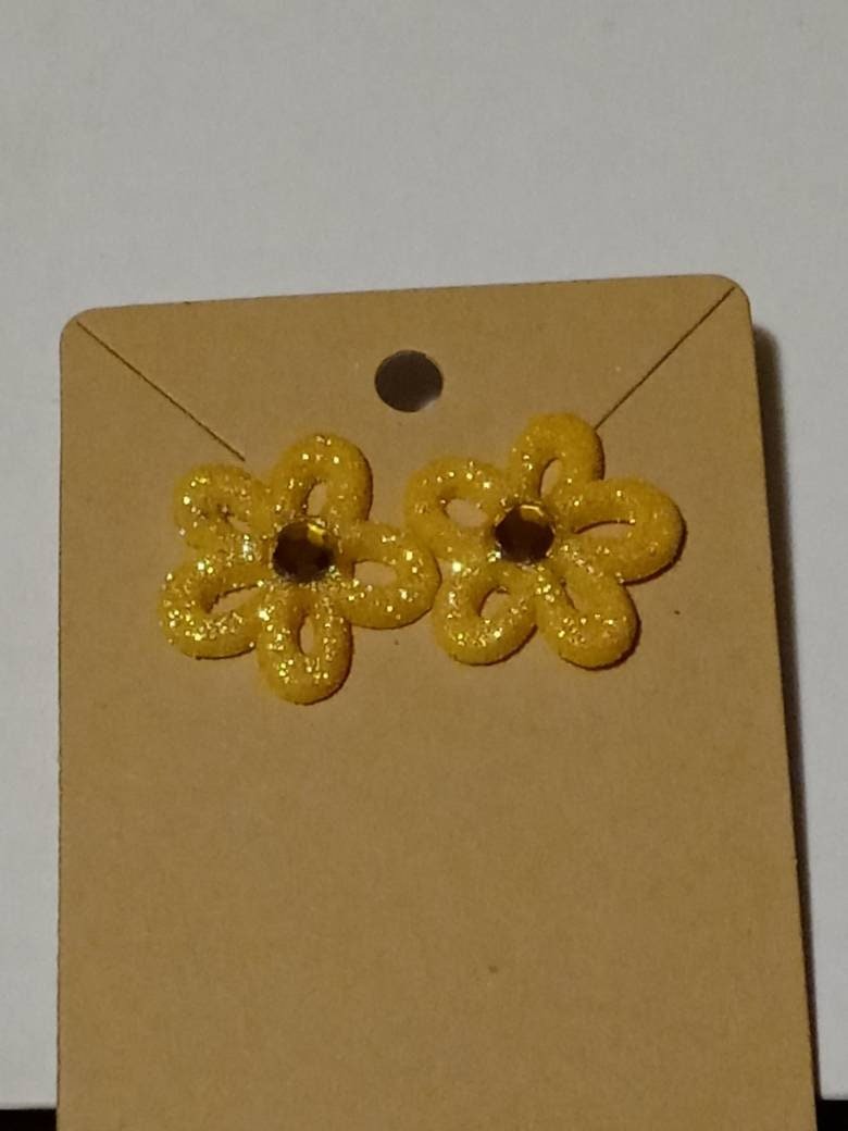 Excited to share the latest addition to my #etsy shop: Sparkling yellow flower stud earrings #fancy #smallgiftidea #handmade #giftidea #floral #sparkling #hypoallergenic #resinsandapothecary etsy.me/3OzedjZ