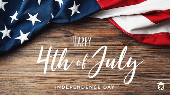 An American flag rests on a wooden table. Text reads, "Happy 4th of July, Independence Day."