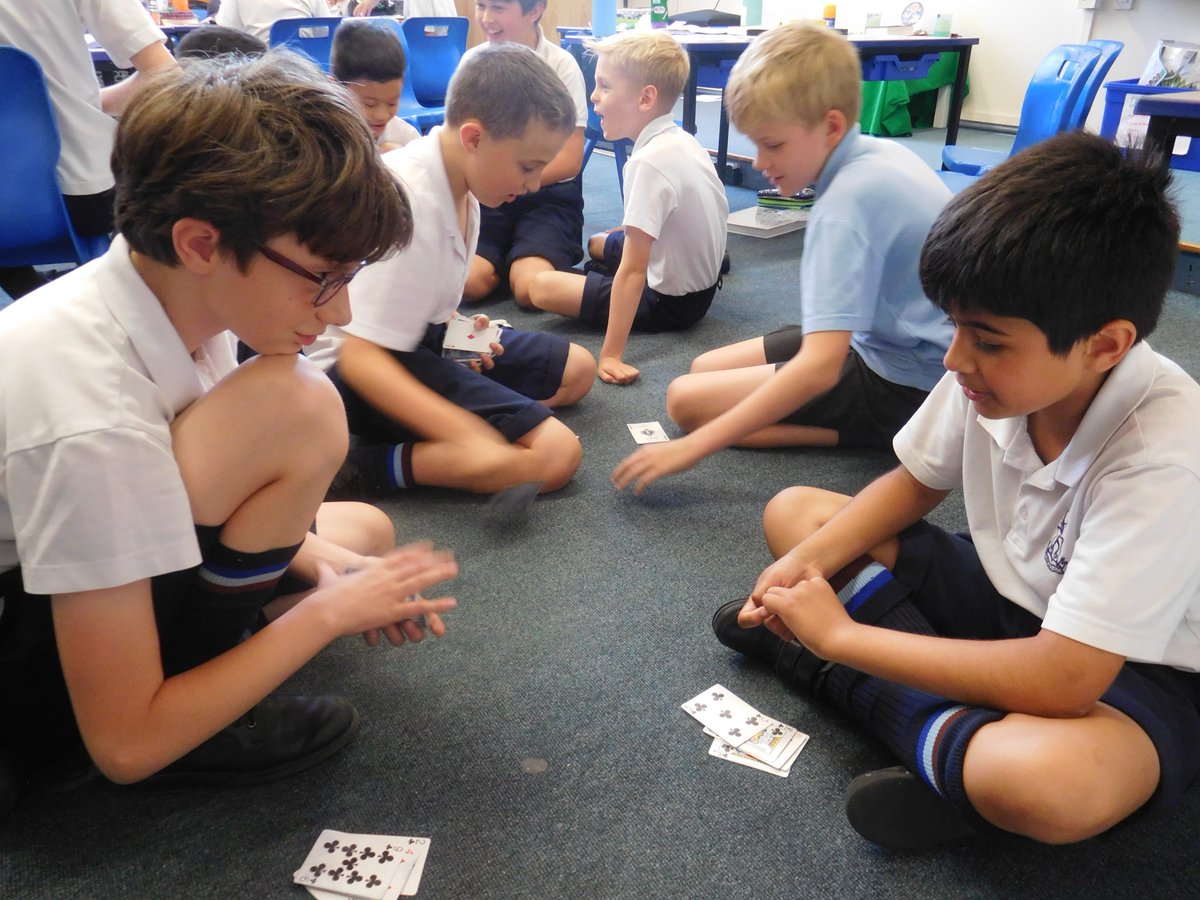 SJBWindsor's tweet photo. Year 5 have been learning about basic probability. At the end of their lesson, they played some games with cards and die to use their probability skills to beat their peers. They also used these skills when playing rock-paper-scissors. #SJBmiddleschool #SJBmaths #SJBfun https://t.co/AcU0Z5T0wT