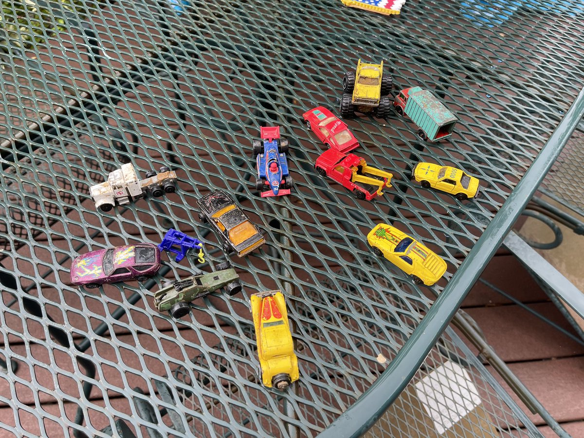 DanetteChilds's tweet photo. Fun find yesterday while working on the pool deck! Joe and I were digging spots for the concrete footings. We kept finding old cars we used to play with in the dirt, before the retaining walls were built, about 30 years ago! https://t.co/qI7dD2dzaz
