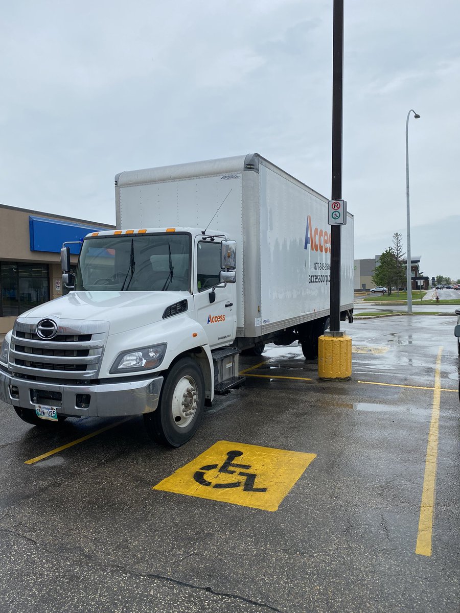 Wow #accesscorp. Not one, but two handicap spaces blocked!  That has to be some kind of record! #poorparking