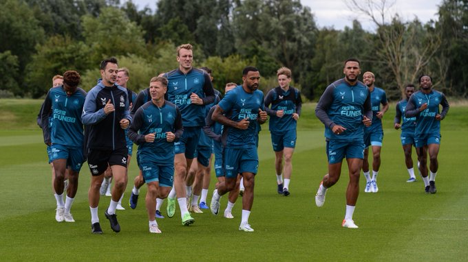 Group shot of the Newcastle United players running on pre-season