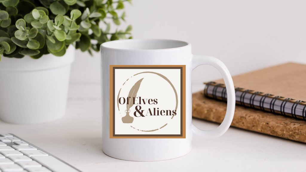 This mug will hold ur favorite beverage as u enjoy ur current read. It's sturdy &amp; glossy w a vivid print of the Of Elves &amp; Aliens Logo. Click on the linktree 4 more details.

 #bookmerch #booknerdmerch #Ofelvesandaliens #mug #tealovers #coffeelovers #readers
