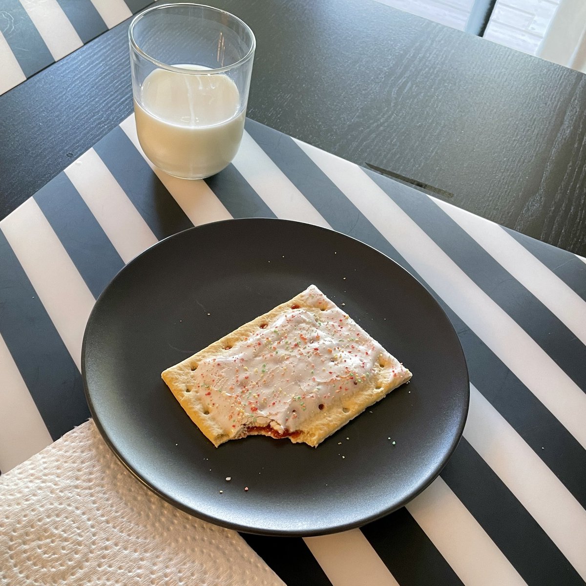 The boy went to the store with his Mom, begged for Pop Tarts, and Mom gave in. Today he learned Pop Tarts are gross… only takes one bite. “I’m actually still full from yesterday, Dad”.