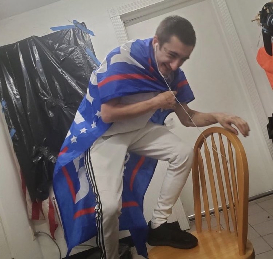 gstuedler's tweet photo. This is the crimo cretin and yes...that is a trump flag he's wearing. https://t.co/yCJBZaMQ7t