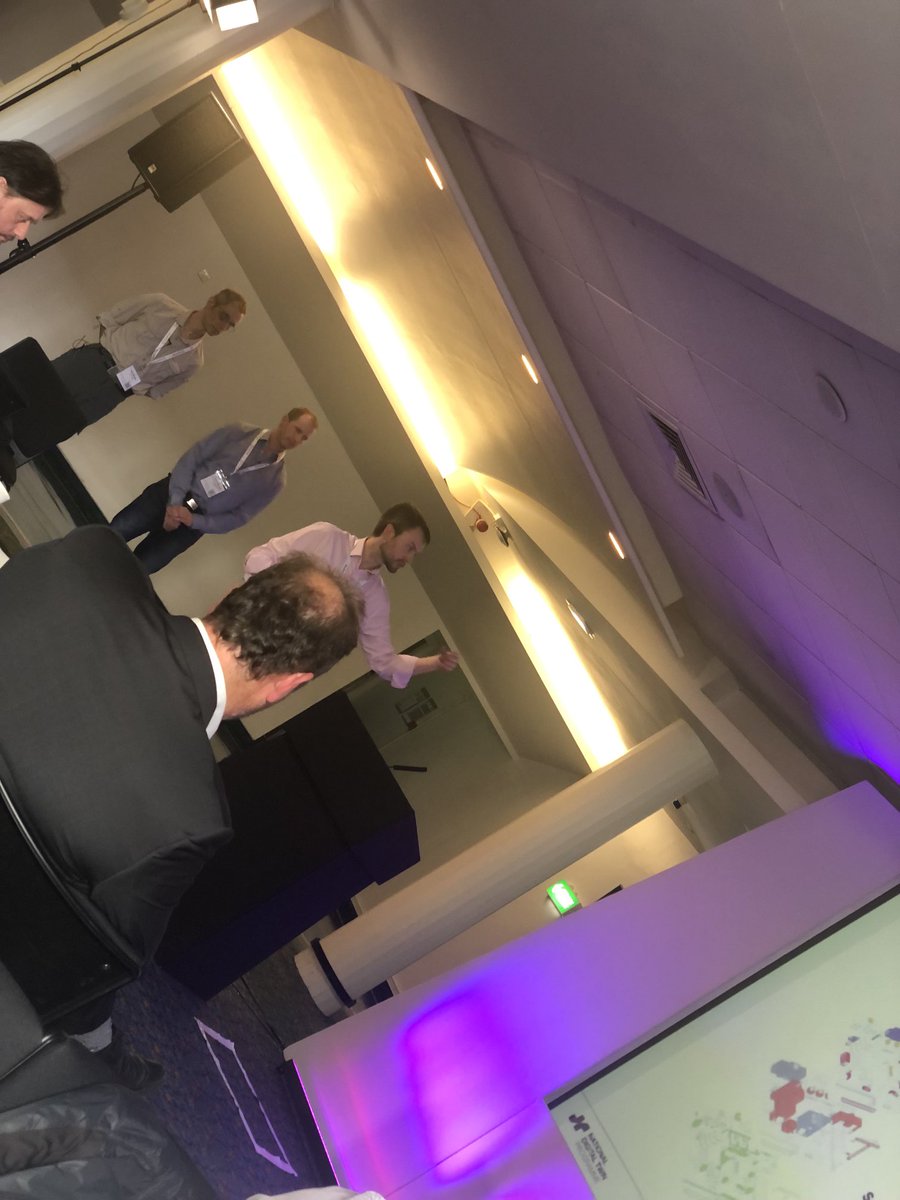 DAFNIfacility's tweet photo. Dr Ben Mawdsley @HartreeCentre with Dr Jens Jensen @STFC_Matters @DAFNIfacility and Dr Jethro Akroyd @cmclinnovations on the #credo climate flood resilience #digitaltwin at the #dafniconference2022 Read more: https://t.co/VAsIzQbeJ0 #flooding https://t.co/UAmLoCd0lm