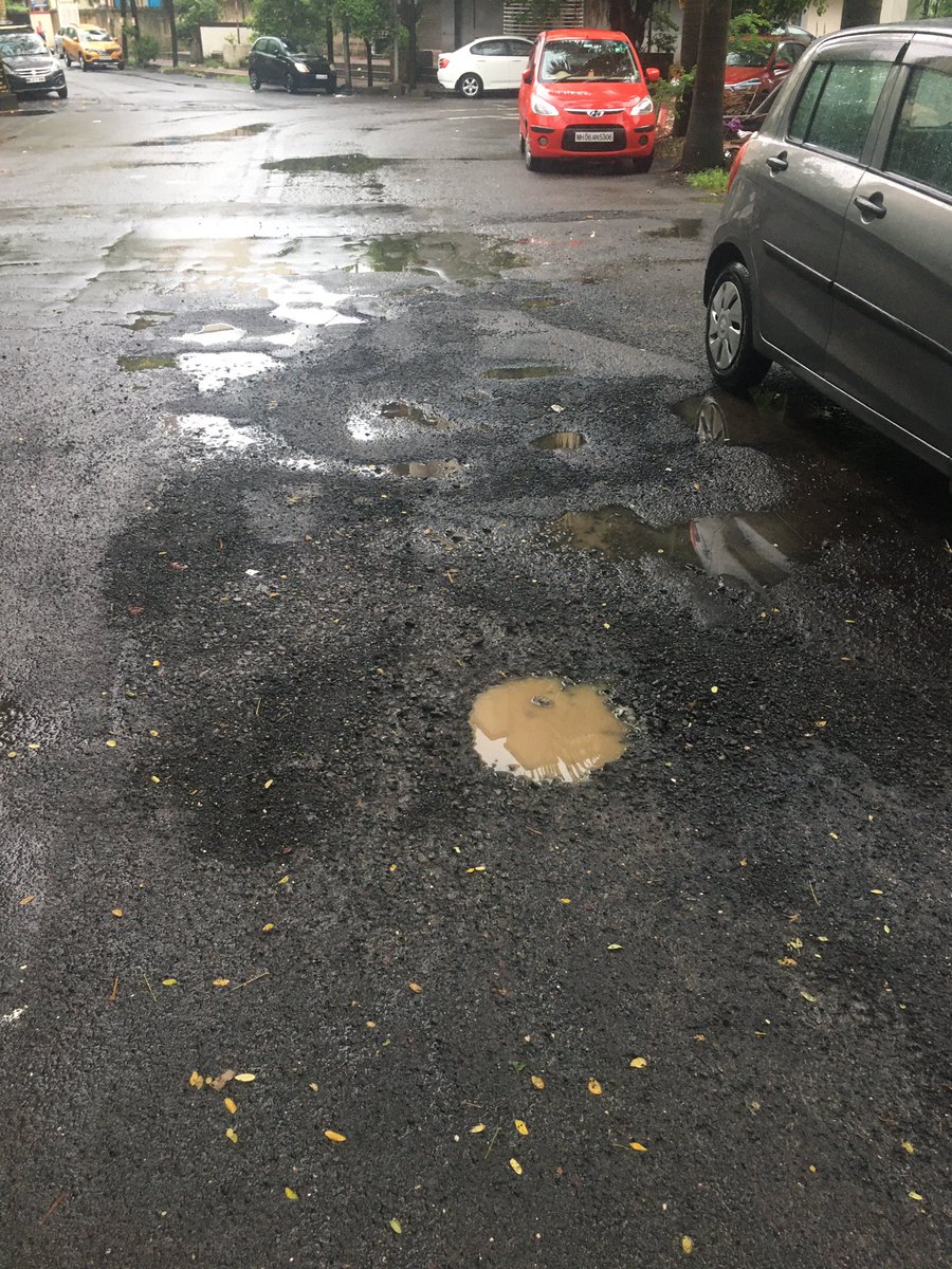 Harsh_Doshi_'s tweet photo. See this road condition I have tweeted this same pic pre monsoon and warned you to take action before it starts raining you didn’t took any action hence see this condition, thanks so much @mybmcWardRC @mybmc Address: Pawandham Road (outside mca club) https://t.co/eWzmEfFSZB
