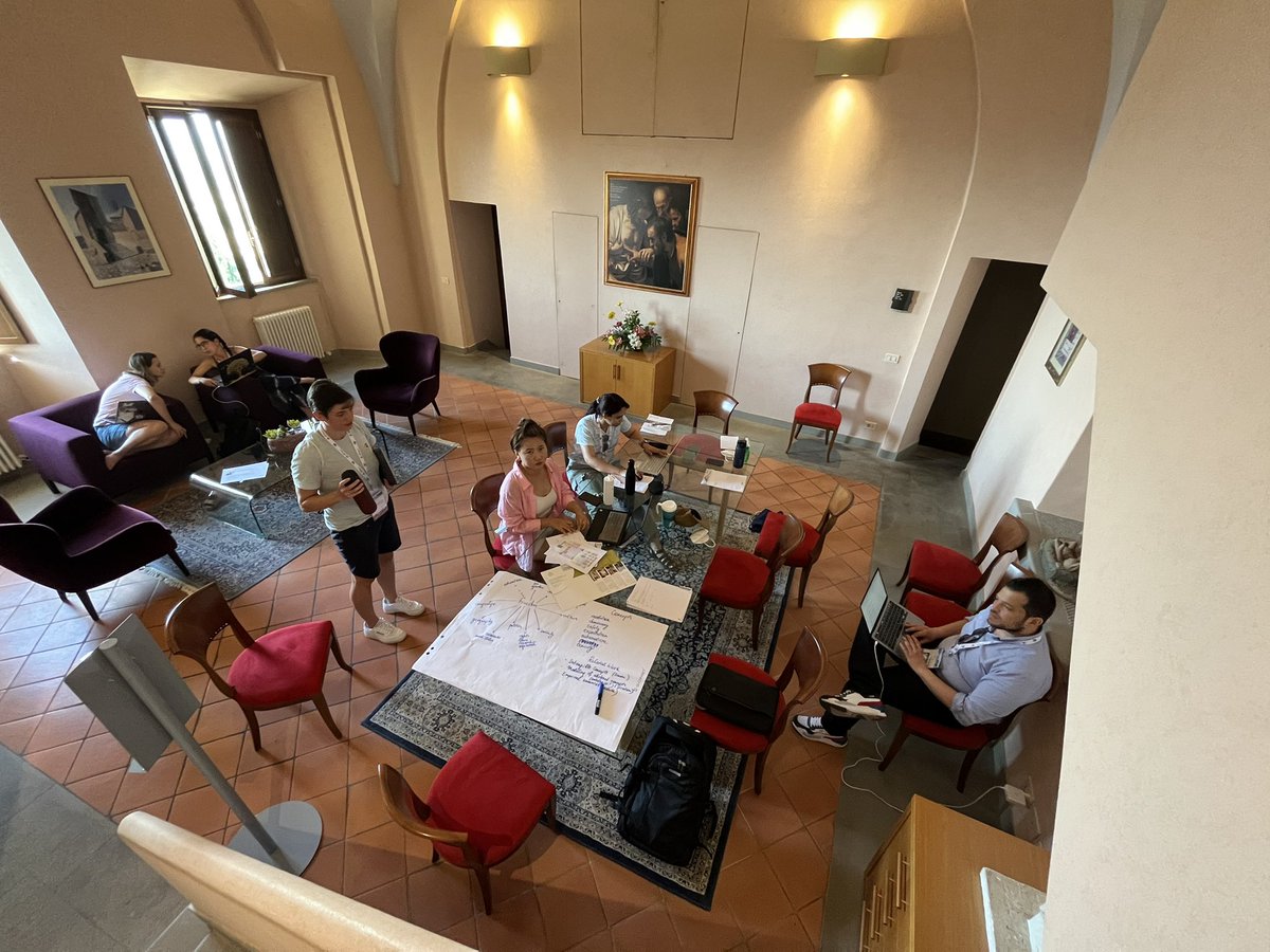 merpeltje's tweet image. Team Hobbit hard at work on their research problem #isws2022 #WorkHardPlayHard