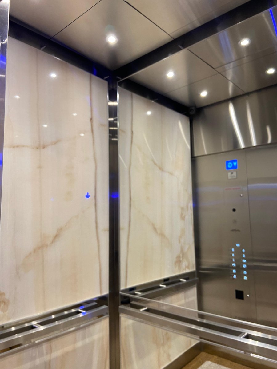 Going through some files and saw this absolute beauty! I had to post, it gave me no choice!! 19 Lower Village Gate. Some serious style. VDF Dimension Series, Fiandre Gold Onyx porcelain, Square stainless steel handrails. #marchelevator #crossbridgepropertymanagement #solucore