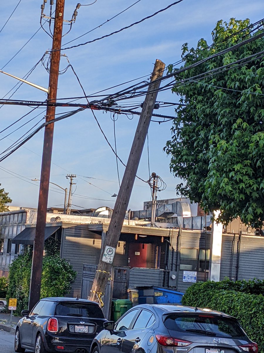 christyandk's tweet photo. @SEACityLight @westseattleblog , who do we call to report this precariously leaning electric pole?? https://t.co/mbiOFYRCrc