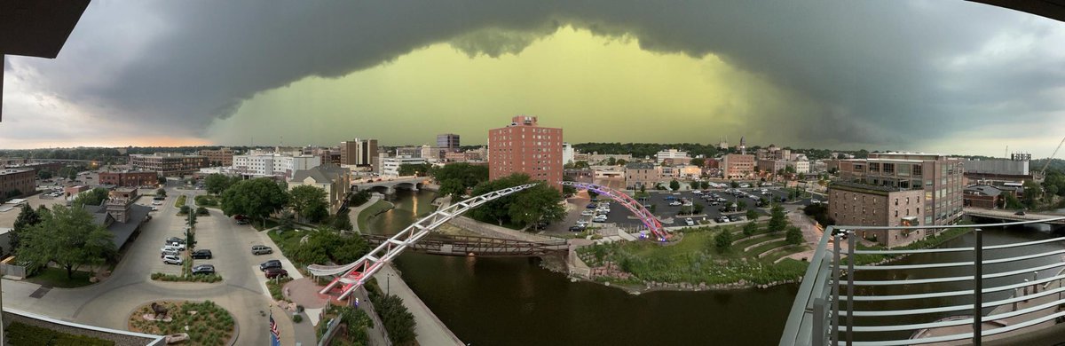 shawncable's tweet photo. My buddy Duke just sent this pic of the storm rolling into downtown Sioux Falls. That's something.  #sdwx https://t.co/9dBq9Lwf4E