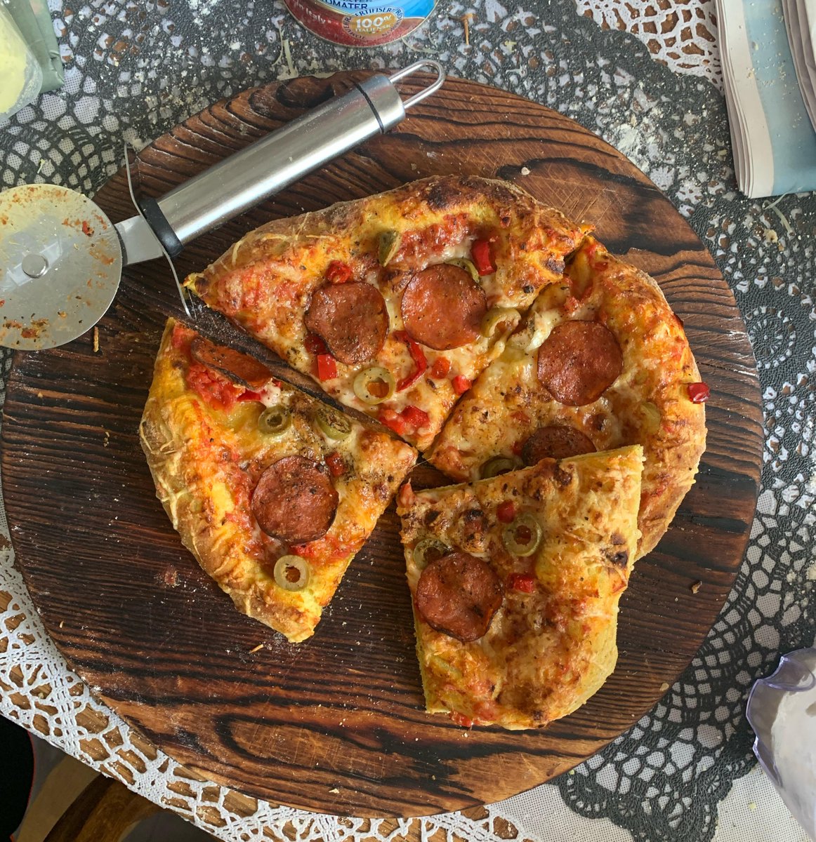 Pepperoni, bell pepper, olive, tomato sauce, with dough having a little curry/curcuma on ferment to give Color, on pizza steel (Via: redd.it/vrtn5g)