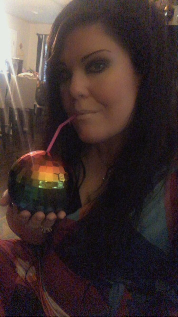 sungoddess5's tweet photo. Today was a Tuesday that acted very much like a Monday, so I have a very blue Margarita in very rainbow disco ball. #IsThisAdulting? https://t.co/KswUsWuolw