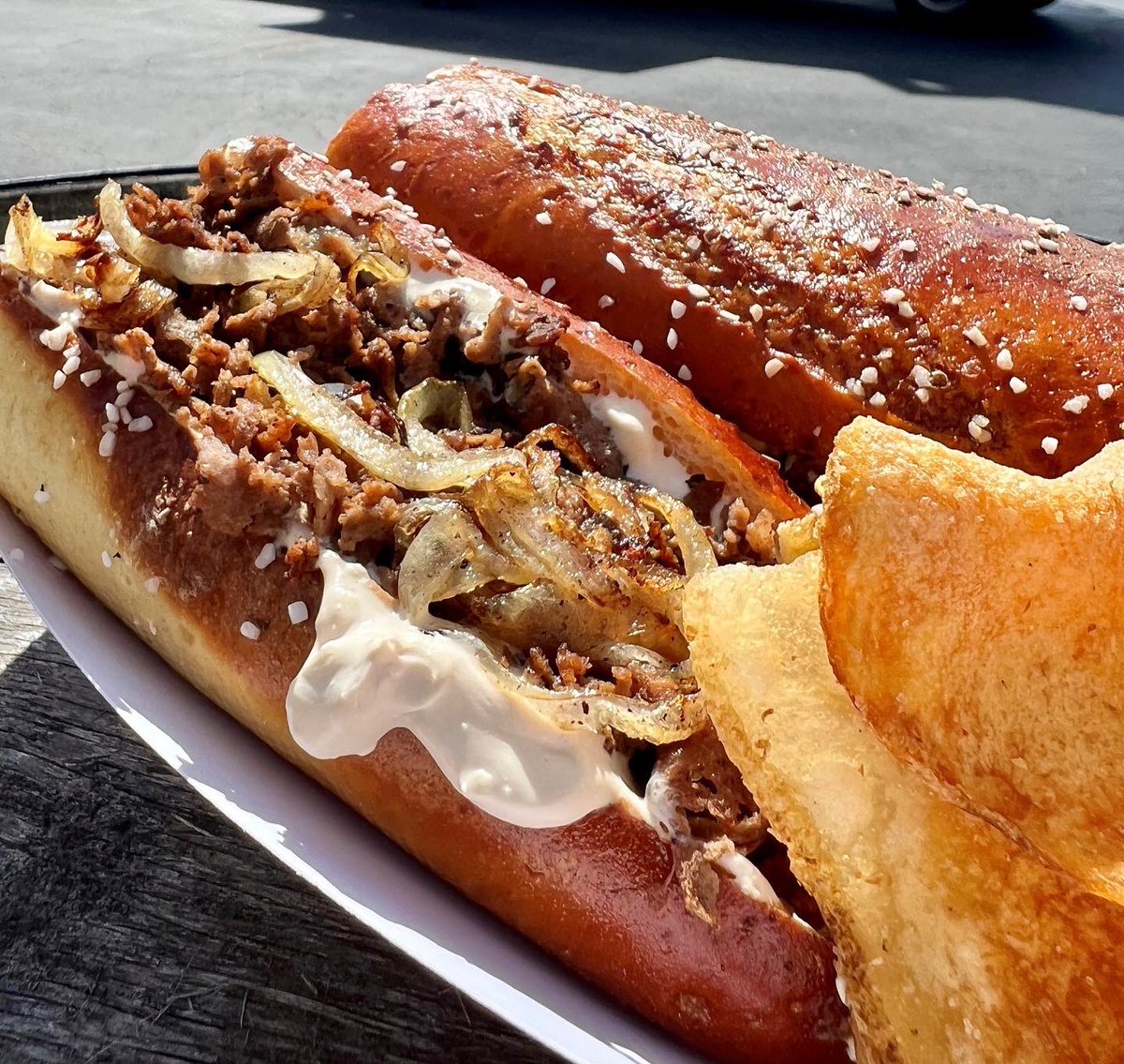 $6 Beer dip cheesesteaks all Month long!!! #Jaysjoint215 Our Pretzel roll spread with our famous Beer dip spread, chopped ribeye steak and deep fried onions on top!#Beerdipcheesesteak #pretzelrollmafia