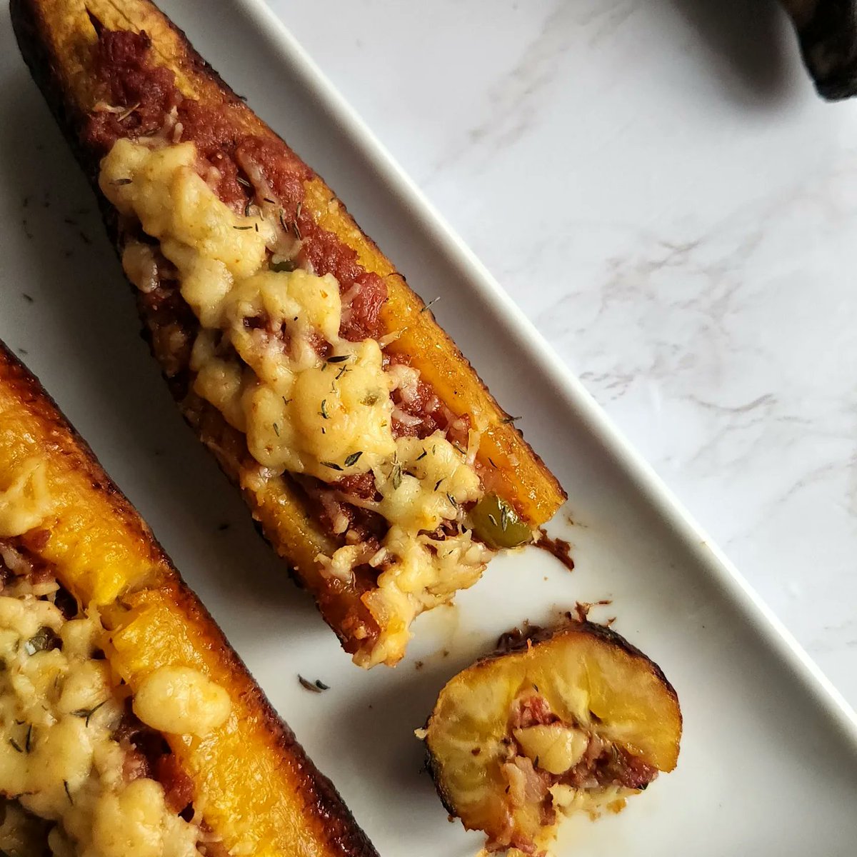 onelovecooking's tweet photo. Plantains stuffed with Habanero Cheese, Corned Beef &amp; more cheese 🧀 😋 

#onelovecooking #Foodie #foodblogger #foodphotography #plantains #cheese #habanero #food #jamaican https://t.co/NsWYP70oP5