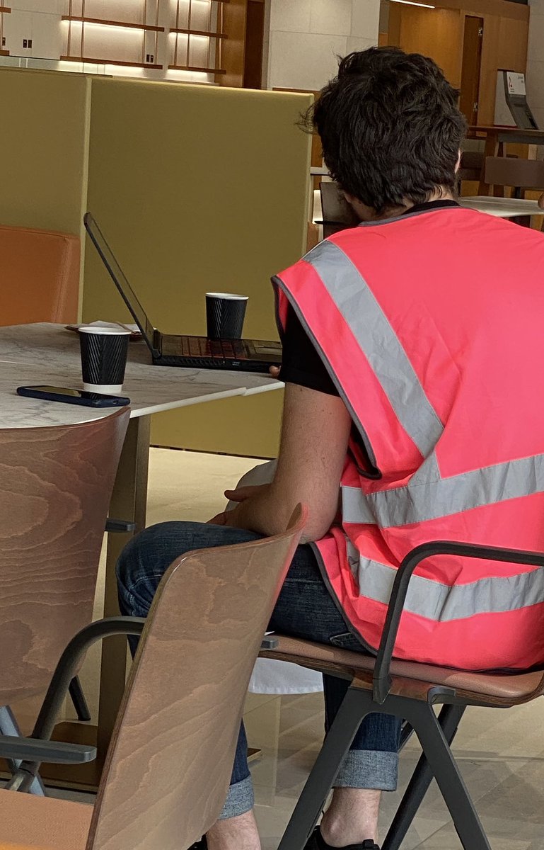 Deym! I need that pink safety vest and wear during visit at construction site!