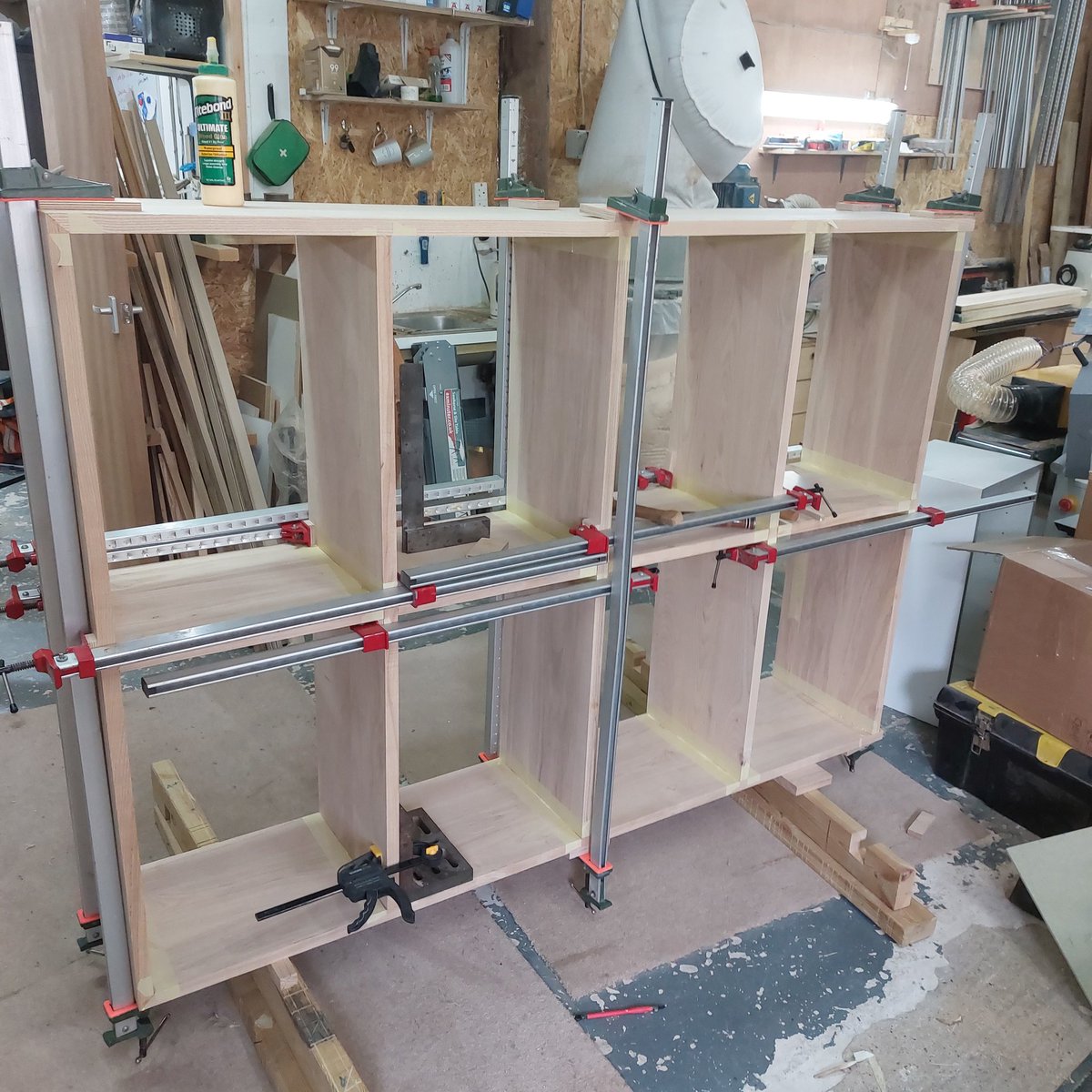 somersetlurcher's tweet photo. Glued up. I don't want to do that again in a hurry. An hour over my self imposed deadline. Much warmer in the workshop so happy it's finished. Its got the weekend to dry now. It's heavy.
#surreyfurnituremaker
#furnituremaker
#furnituredesign
#bespokefurniture
#bespokebookcase https://t.co/j99cDNYhDg