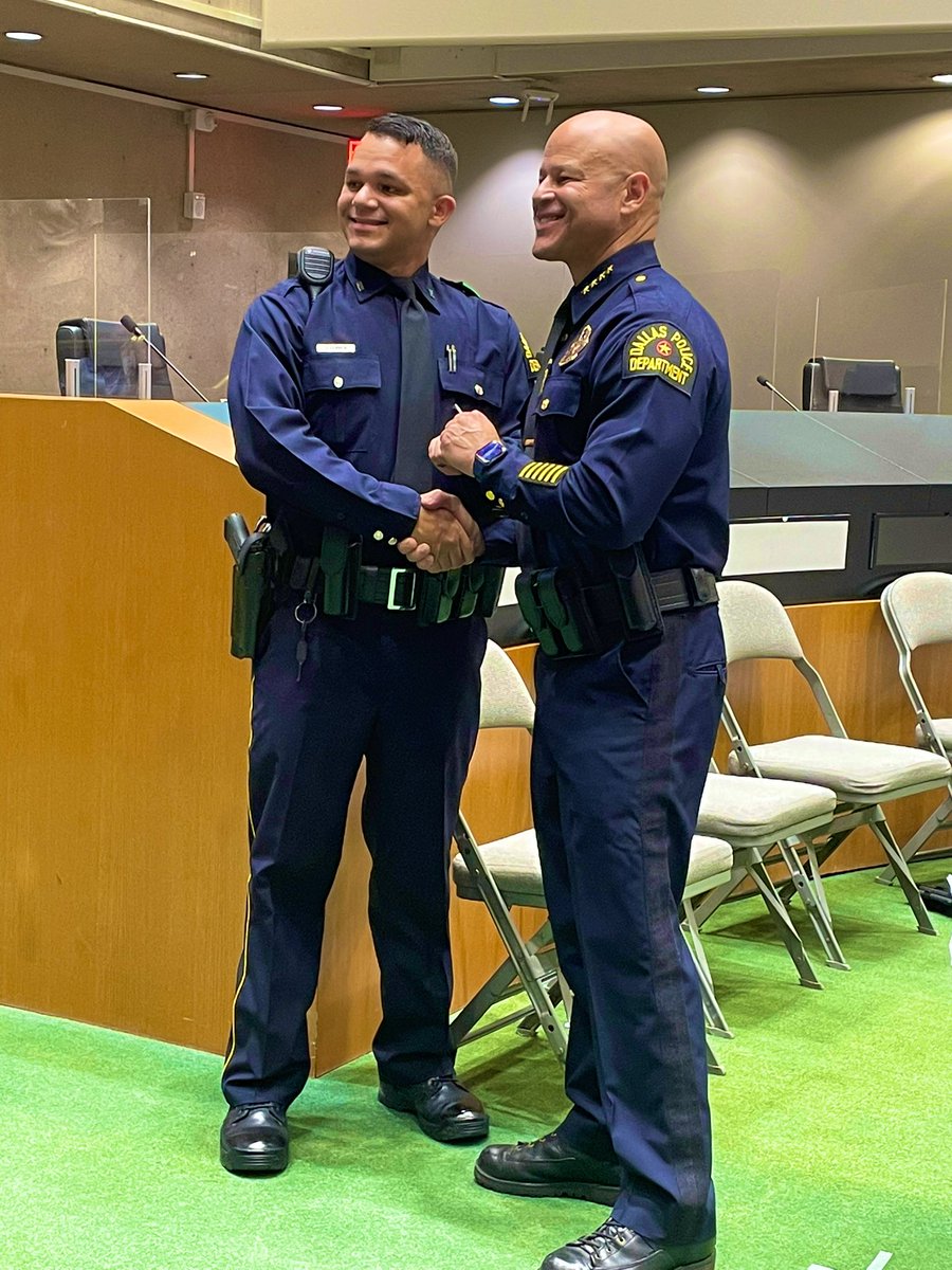 DallasPD's tweet photo. The @DPDAcademy #Class380 graduates take their badges as they are called onto the stage. You have accomplished your goal! @DPDChiefGarcia https://t.co/rUjq5BMZxc