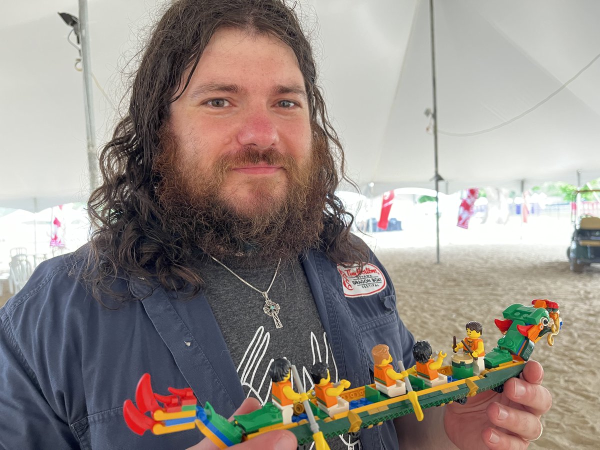 Tiny re-creation of Ottawa's Dragonboat Festival made of LEGO bricks, the builder Matthew Ready, shows off his creation at this year's event, <a href="/HallieCBC/">Hallie Cotnam</a> 91,5fm